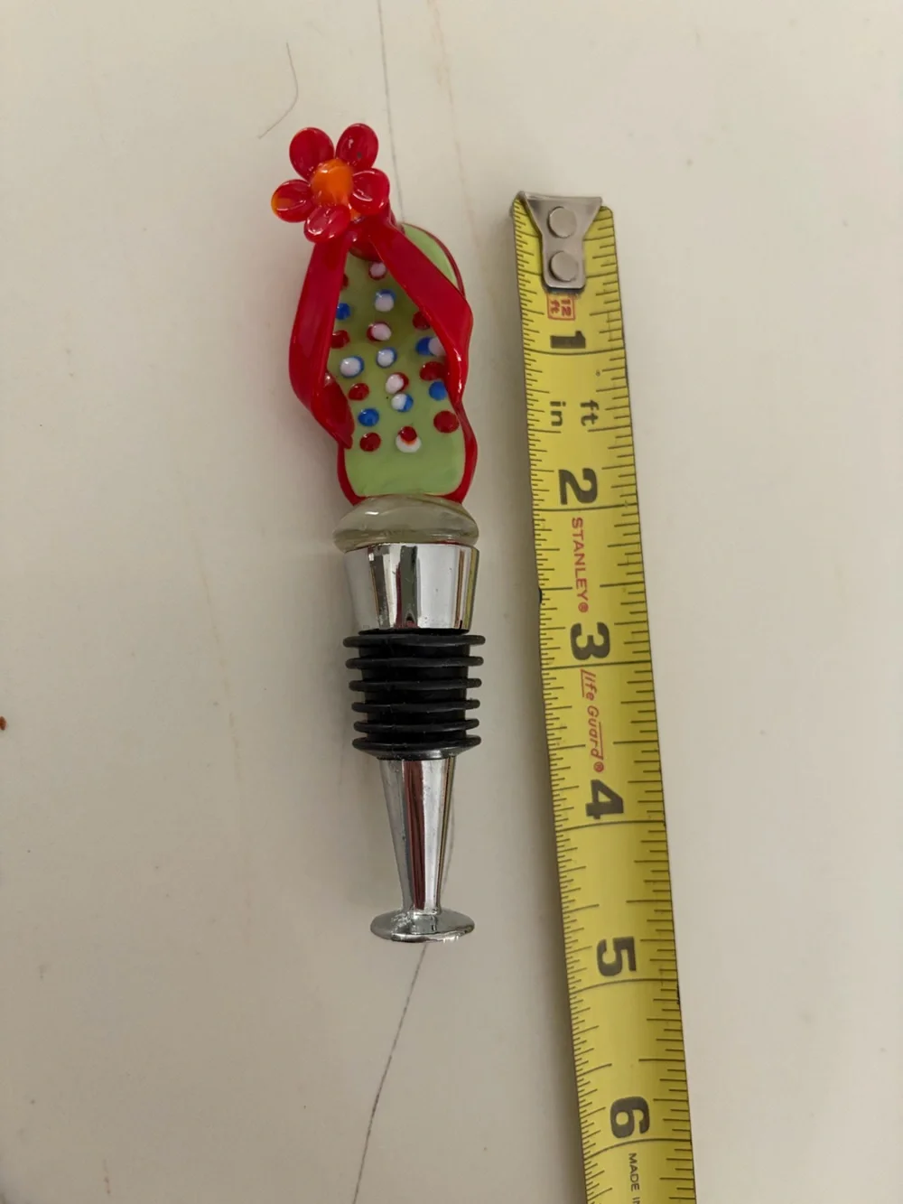 Glass Flip-Flop Wine Stopper with Red Flower Accent